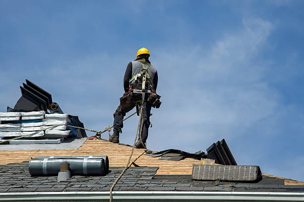 Professional Gutter Installation technician working in Hesston, KS